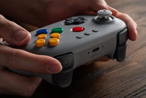 Vista 7 de 8BitDo 64 Bluetooth Controller for Analogue 3D, Switch, Switch 2, Windows, and Android (Grey)