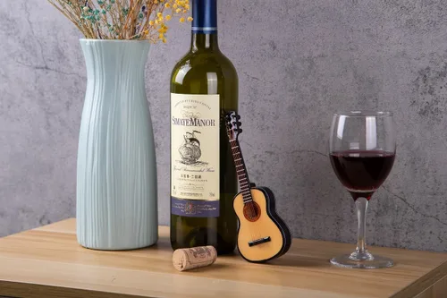 Vista 4 de ALANO Guitarra clásica de madera modelo mini instrumento musical con soporte decorativo regalo (G-10-S)