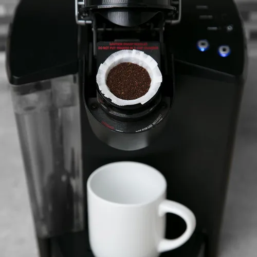 Vista 6 de Filtros desechables para uso en cafeteras Keurig® (paquete de 50) - Tazas simples - Usa tu propio café