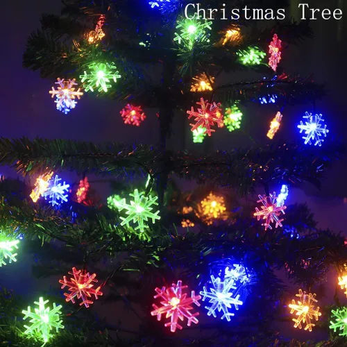 Vista 3 de Anfunman Guirnalda de luces solares de copo de nieve de Navidad, 50 luces LED de 30 pies, impermeables, luces de hadas solares de Navidad, 8 modos