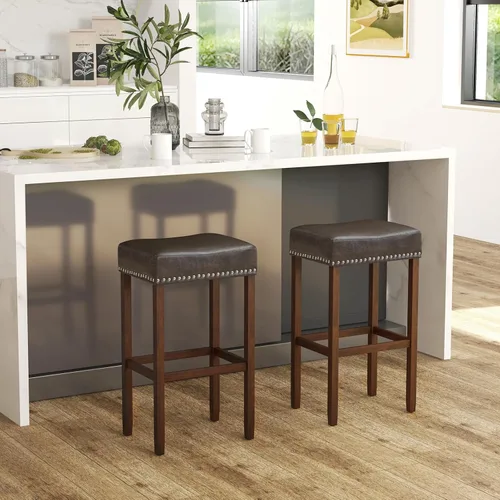 Vista 27 de Giantex Juego de 2 taburetes de bar de 24 pulgadas en forma de silla de montar, taburetes de cuero sintético con reposapiés, taburetes de bar