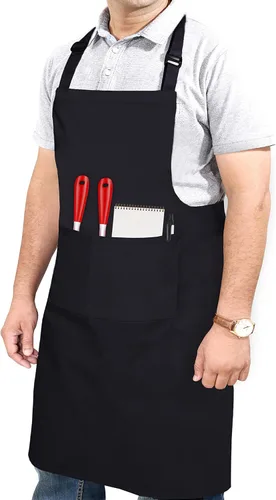 RUVANTI Delantales de trabajo para hombres y mujeres con bolsillos, ajustables hasta XXL, durabilidad de grado profesional, delantal negro para